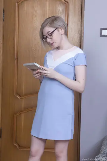 Petite Blonde in Glasses Spreads Her Hairy Pussy