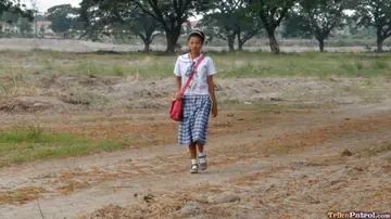 Filipina Undresses and Poses Nude Outdoors
