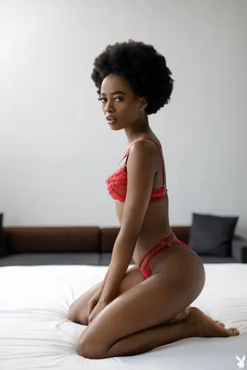 Skinny Ebony Brunette in Lingerie Poses on the Bed