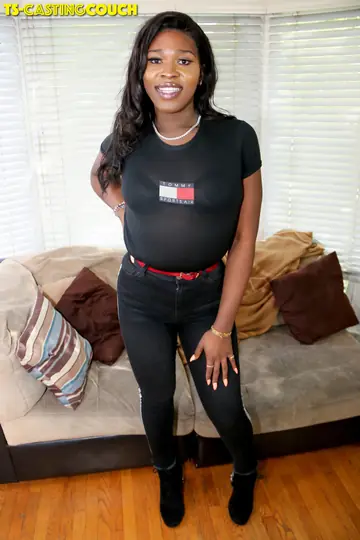 Curvy Ebony Trans Woman Strips Nude and Poses on the Sofa