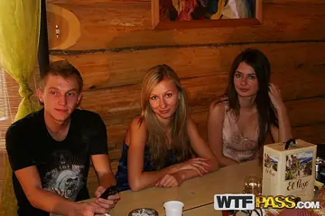 Two Women and a Man Have Anal Threesome in Log Cabin