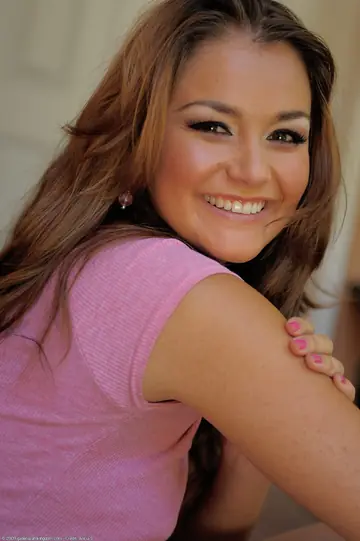 Allie Haze – Tanned European Brunette in a Skirt and Panties Reveals Her Shaved Pussy