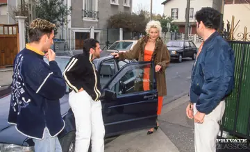 Blonde Engages in Group Sex Outdoors