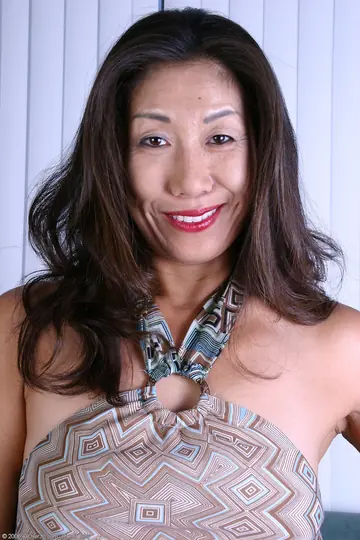 Thick Asian MILF Undresses and Spreads Her Trimmed Pussy