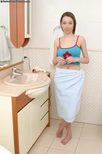 Busty Slim Babe with Hairy Pussy Fingers Herself in the Bathroom
