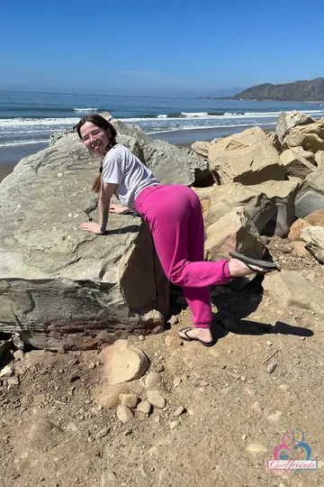 Petite Brunette Shows Her Shaved Pussy on the Beach