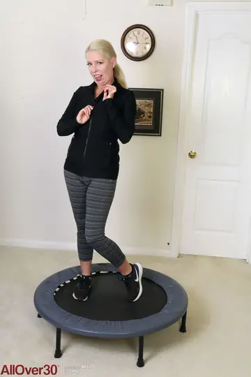 Curvy Mature Blonde Strips Out of Her Yoga Pants on Trampoline