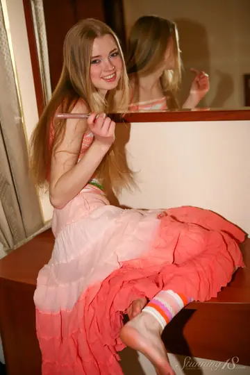Blonde in a Skirt and Socks Spreads Her Legs