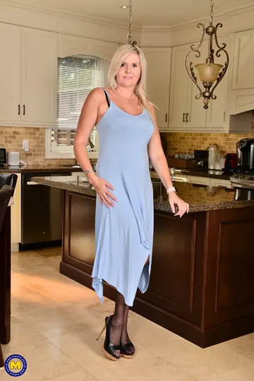 Tall Blonde MILF in Stockings Parts Her Thighs