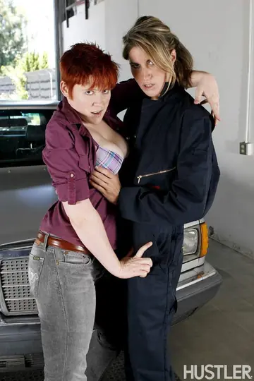 Lily Cade – Mature Brunette and Redhead Lick and Finger Each Other on a Car in the Garage