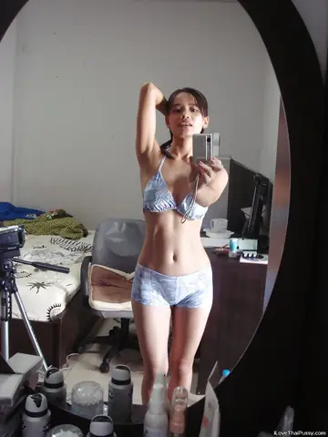 Asian Woman Spreads Her Trimmed Pussy in the Mirror