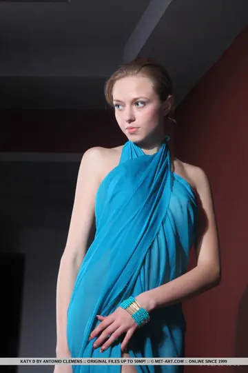 Katy D – Tall Slim Blonde Strips Out of Her Skirt and Shows Her Shaved Pussy