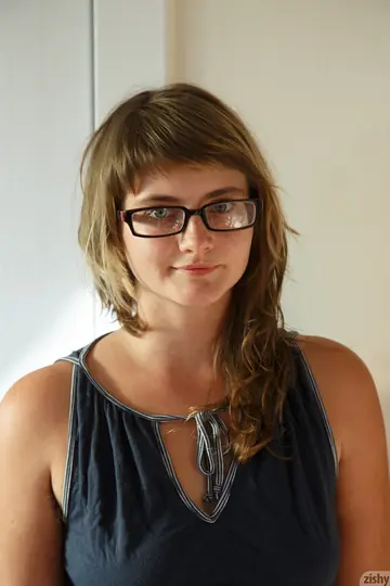 Petite Brunette with Glasses Shows Her Hairy Pussy Nude
