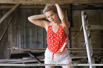 Tall German Woman Poses Nude in a Forest Barn