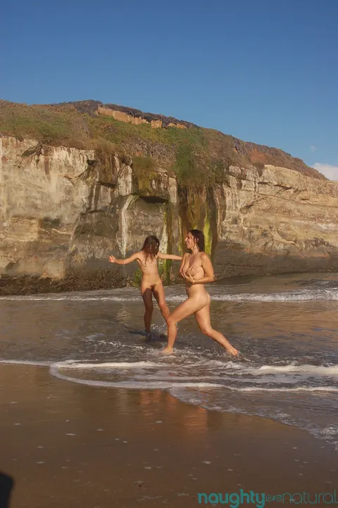 Ava Solanas & Nikki Silver: Busty Hairy Brunettes Spread on the Beach – photo 10 of 21