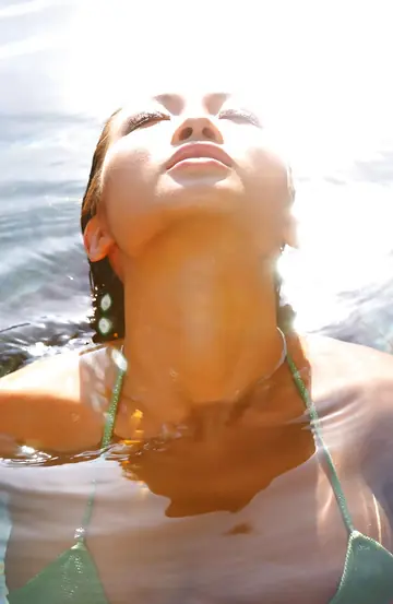 Debra Ling – Asian Brunette with Big Enhanced Tits Poses Outdoors