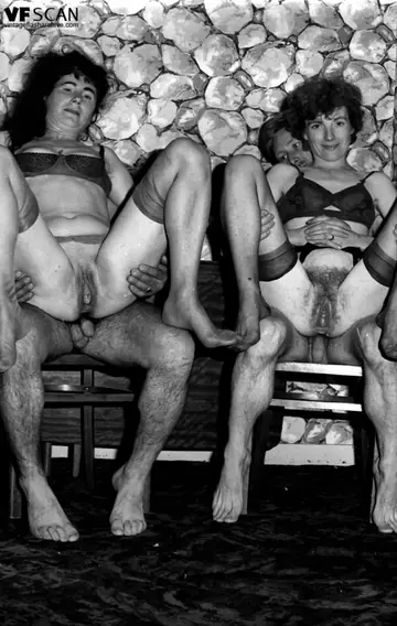 Woman in Vintage Lingerie and Stockings Has Group Sex with Men