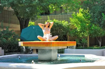 Woman Masturbates with a Hairbrush Outdoors
