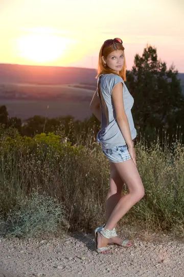 Violla A – Redhead in Glasses Spreads Her Pussy on the Beach
