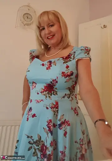 Blonde British MILF Spreads in Her Dress and Stockings