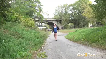 Amanda Hill – Tattooed Tall Brunette Pulls Down Her Shorts and Pees on Public Path