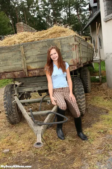 Petite Slim Woman in Boots Toys Her Pussy and Fingers Herself on a Farm