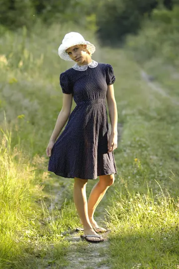 European Blonde Spreads Her Legs Outdoors in a Short Skirt