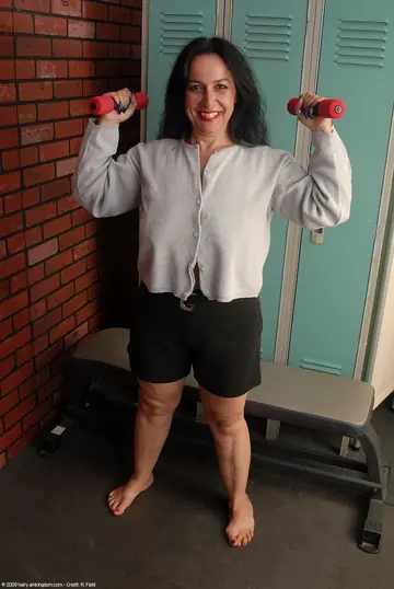 Nina Swiss – European Brunette MILF Strips Out of Her Shorts