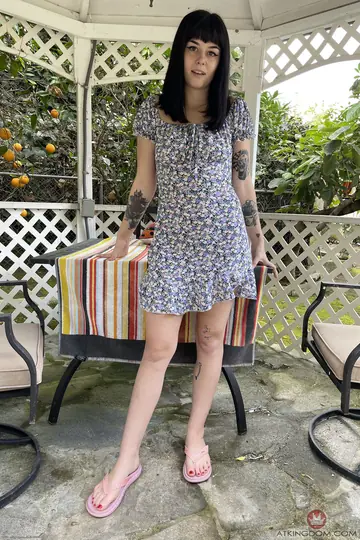 Thick Brunette with Hairy Pussy and Tattoo Spreads Outdoors