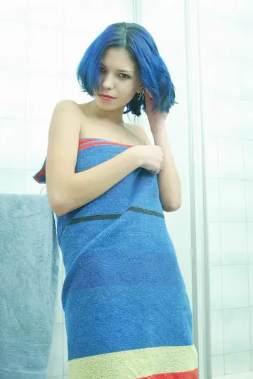 Slim European Babe Spreads Her Shaved Pussy in the Bathroom