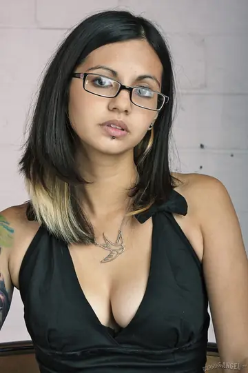 Holly D – Busty Asian Brunette in Glasses Strips Nude