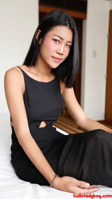 Petite Asian Trans Woman Poses and Undresses in a Black Dress and Fishnets