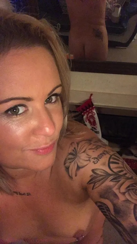 Blonde MILF Strips for a Selfie Showing Her Pierced Nipples – photo 14 of 15