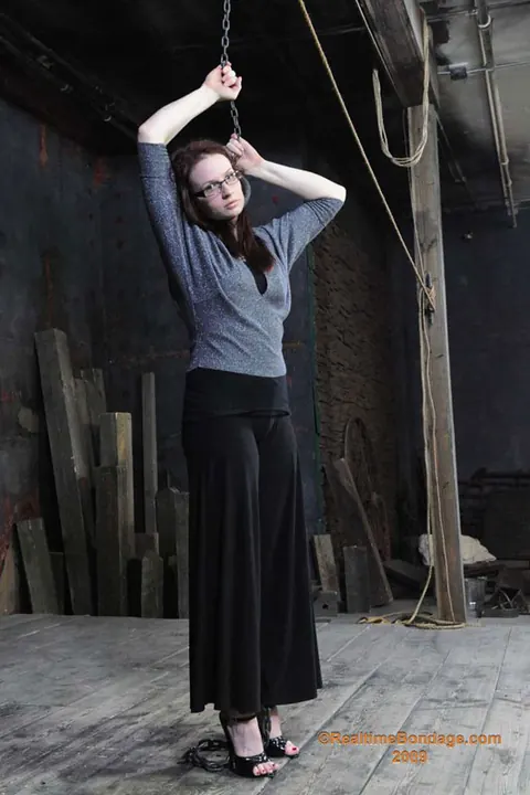 Claire Adams: Redhead MILF in Glasses Gets Wrapped Tight in Latex Mummification – photo 2 of 16