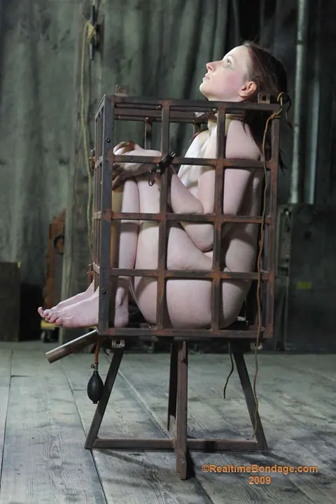Claire Adams: Redhead MILF in Glasses Gets Wrapped Tight in Latex Mummification – photo 11 of 16