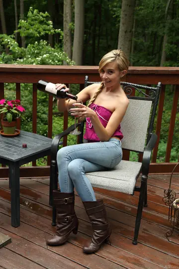 Kaylee Haze – Skinny Blonde in Pigtails Plays with a Toy Outdoors