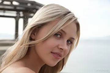 Blonde European with Big Tits Strips Out of Her Skirt on the Balcony