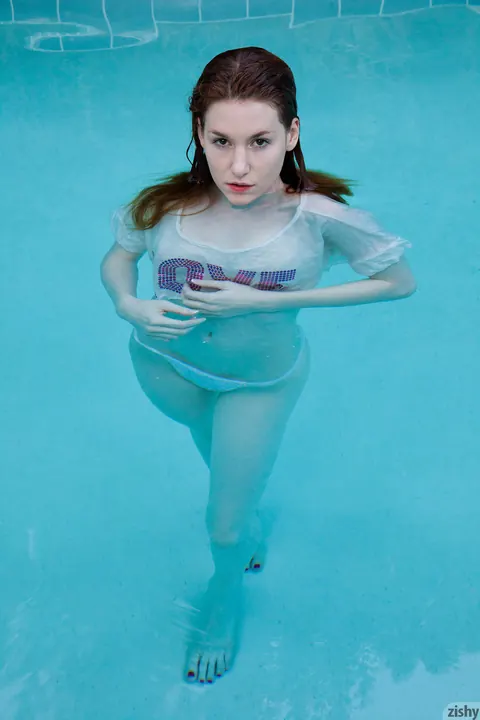 Emily Archer: Busty Redhead PAWG Poses in a Bikini by the Pool – photo 10 of 12
