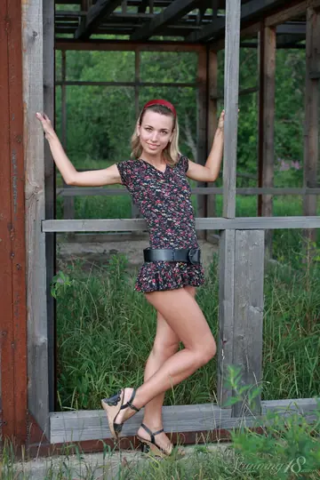 Slim Woman Strips Nude in High Heels in an Abandoned Greenhouse