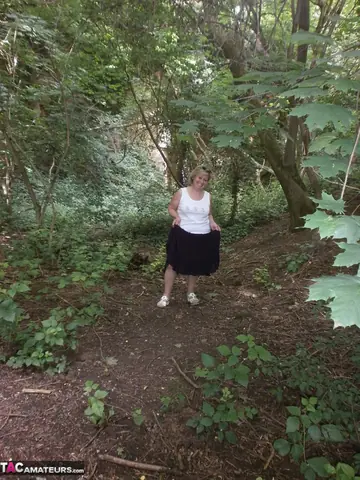 Thick MILF in Stockings Fingers Her Hairy Pussy on the Forest Bench
