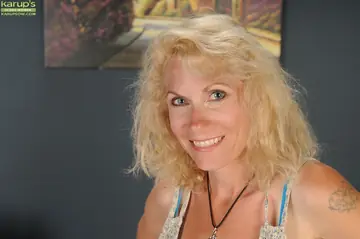 Shay Nollen – Thick Mature Blonde in Shorts and Heels Strips and Spreads Her Pussy