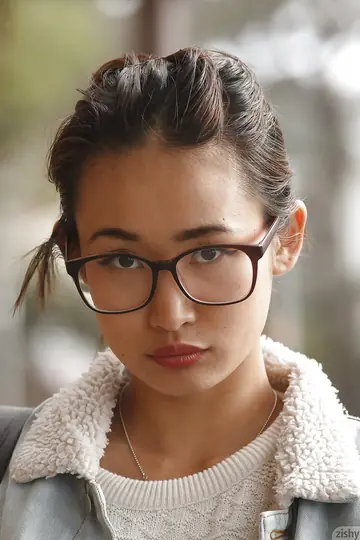 Japanese Babe with Big Tits Poses Outdoors in Glasses