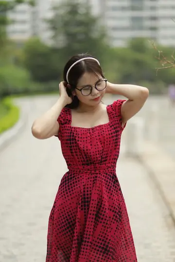 Asian Woman in Glasses Poses Nude Outdoors