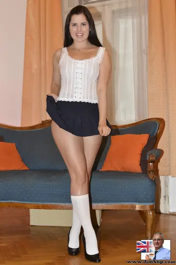 Cassie Fire – Thick Russian Brunette in Stockings Lifts Her Skirt to Show Panties