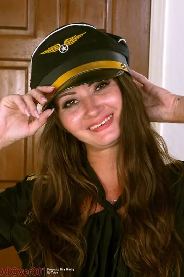 Mia Molly – Thick Brunette MILF Strips Out of Her Pilot Uniform and Spreads Her Pussy