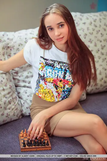 Messiah – Redhead Strips Out of Her Panties and Spreads at the Chessboard