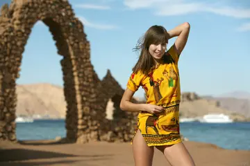 Hairy Woman Spreads Her Pussy on a Beach