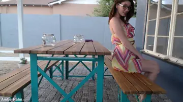 Amber Hahn – Busty Brunette in a Skirt Plays with a Dildo Outdoors