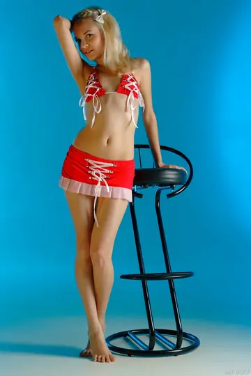 Blonde PAWG in a Bikini Strips and Spreads Her Shaved Pussy