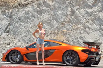 Anya Amsel – Tall Model in Shorts Masturbates with a Dildo in a Sports Car